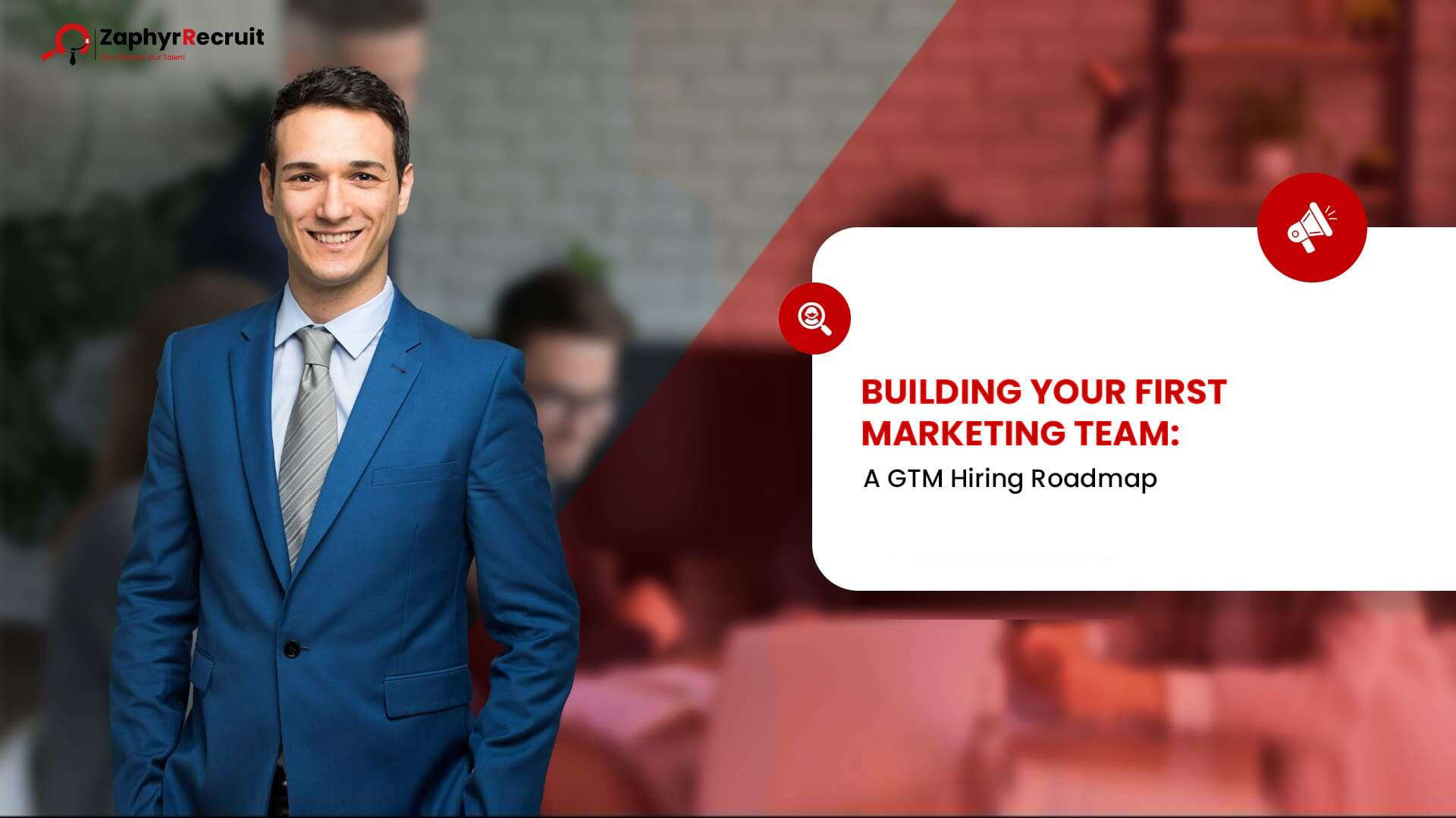 Smiling male executive in a blue suit next to a title card reading Building Your First Marketing Team: A GTM Hiring Roadmap.