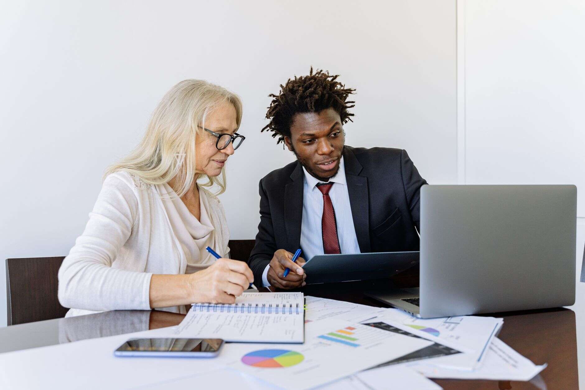 Customer success manager going through account charts with a customer