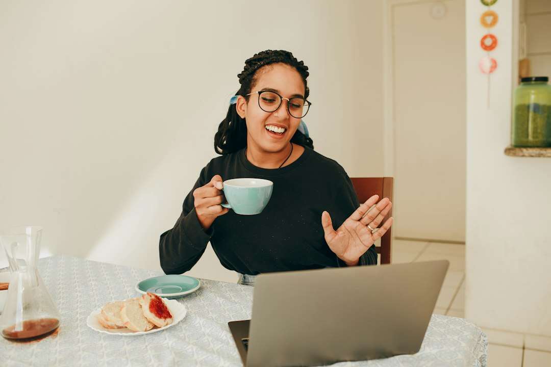 Customer success manager smiling on a video call with a client